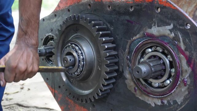 Rotavator side gear assembly installation in progress