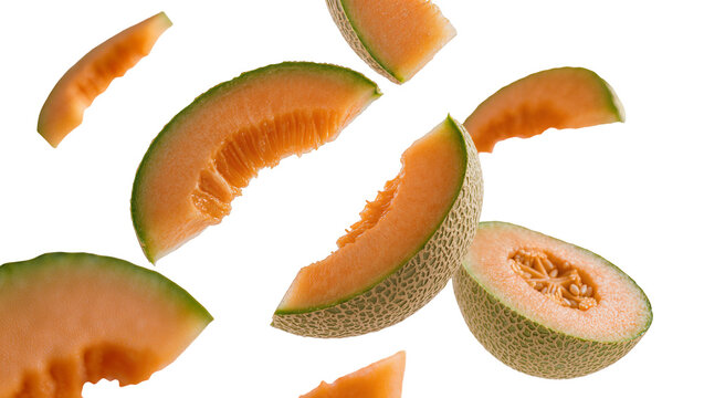 Isolated fresh cantaloupe slices and halves scattered on a clean background, healthy fruit