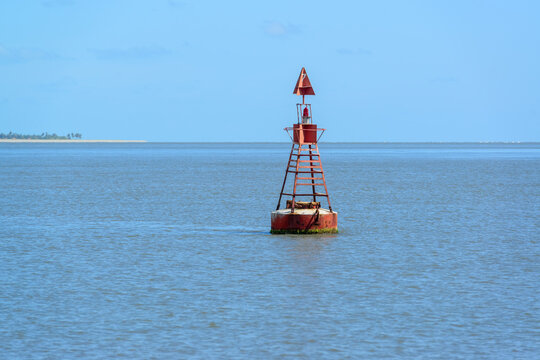 Red Navigation Buoy Marking a Shipping Channel in Coastal Waters of Northeast Brazil, Cabedelo, Paraiba, Brazil