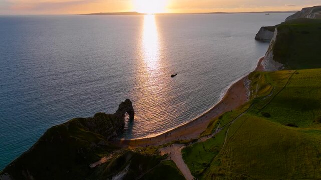 Aerial view of Durdle Door, a natural limestone arch on the Jurassic Coast near Lulworth in Dorset, England
