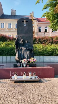 Plac Niepodleglosci forms a vibrant public square surrounded by historic architecture inviting pedestrians to experience the city's cultural atmosphere in Przemysl, Poland