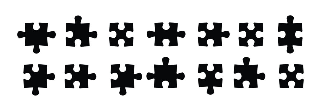 Puzzle Pieces Arranged: A collection of black puzzle pieces, each with unique interlocking tabs and slots, are displayed in two neat rows, symbolizing connection and problem-solving.