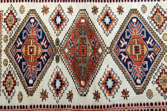 Textures and patterns in color from woven carpets