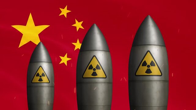 Nuclear missiles against china flag background: geopolitical tension and military defense concept warhead