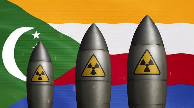 Nuclear missiles with comoros flag background: global security and geopolitical concept warhead