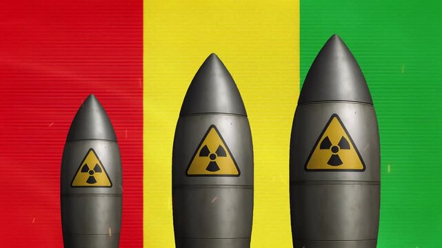 Nuclear missiles against guinea flag background: global security and geopolitical conflict concept warhead