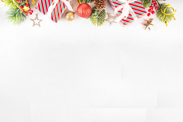 White background with Christmas border with gifts and holiday baubles