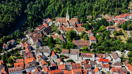 A panoramic aerial view beside the old town and monastery in the city Blaubeuern in Germany on a sunny summer afternoon.  © Peter