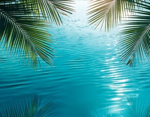 Fototapeta premium tropical palm leaves reflecting on blue water surface background with light ripples vacation concept