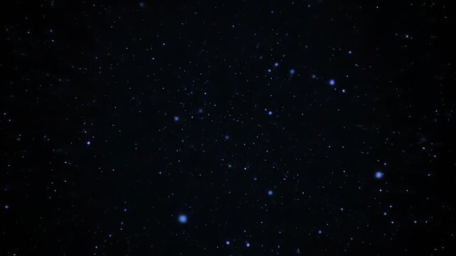Dark night sky with myriad of blue starlight and spots of faint light