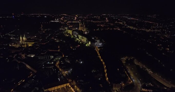 Prague Czechia Aerial v103 cinematic drone flyover Hradcany hilltop castle complex featuring St. Vitus Cathedral and night cityscape of Orechovka neighborhood - Shot with Mavic 3 Cine - November 2022