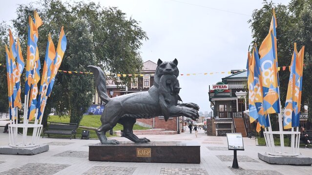 Irkutsk, Russia - August 21 , 2021: Babr Sculpture siberian tiger symbol of Irkutsk city in summer sunny day