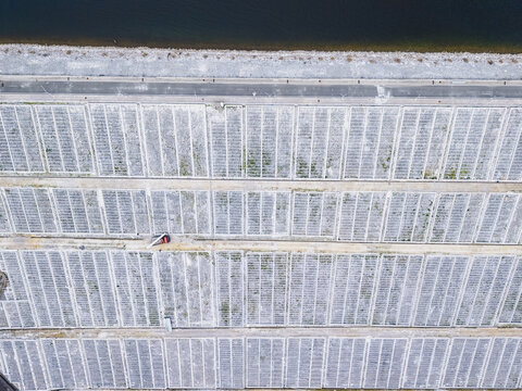 Aerial view of solar panel arrays at the Vau i Dejes Hydroelectric Power Station, featuring rows of photovoltaic panels being constructed in Vau i Dejes, Qarku i Shkodres, Albania.
