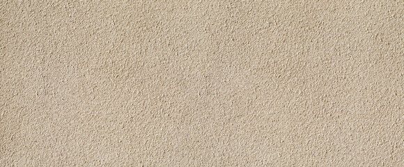 Gritty beige plaster wall texture background © Kornienko Alexandr