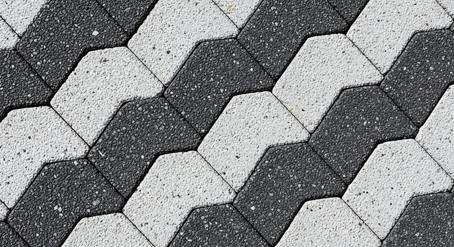 Monochrome paving stone texture with interlocking zigzag pattern design concrete cobblestone sidewalk architecture monochrome geometric construction material hardscape repeating