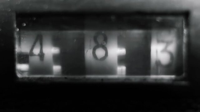 Digital countdown timer display on modern technology interface with audio, video and media equipment concept, black background electronics, computer and stereo connection system