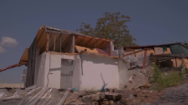 Partially Demolished House with Roof Removed