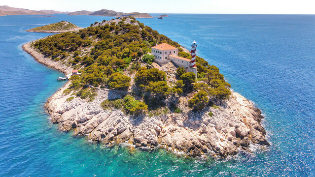 Aerial view of the lighthouse and rocky coastline within Telascica Nature Park, Sali, Zadarska zupanija, Croatia.