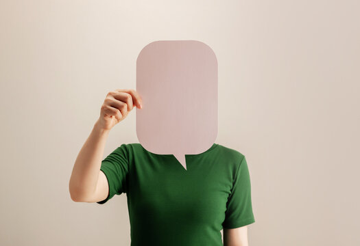 Woman holding a blank speech bubble,freedom of expression, communication