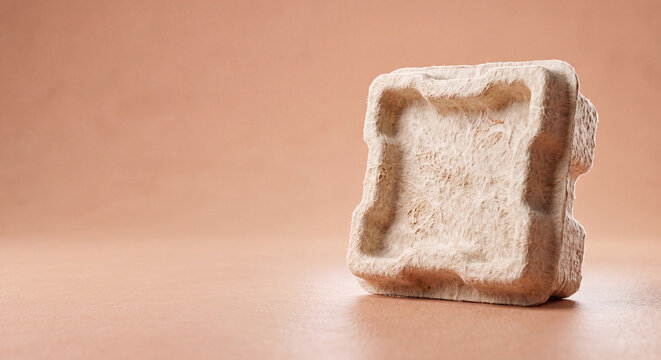 Recycled paper pulp packaging insert for product protection, an eco-friendly cushioning material