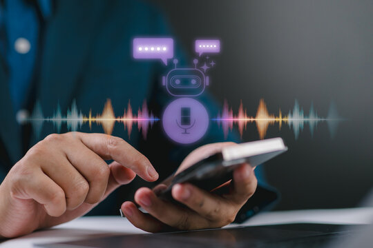voice enabled AI chatbot assistant on mobile device. hand using smartphone with ai chatbot and voice assistant interface for smart communication, digital support and virtual conversation technology