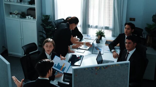 Top view of diverse business people brainstorm marketing idea while marketing team analyst stock market investment. Group of skilled project manager solving problems and sharing plan. Directorate.