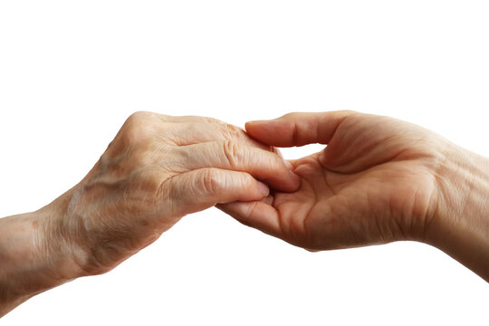 Younger person gently holding an elderly person's hand isolated on white background