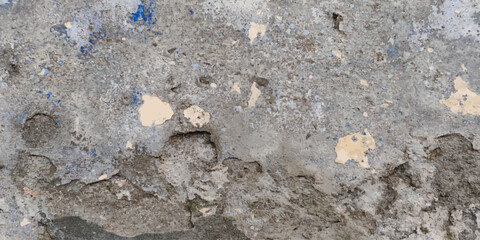 Fototapeta premium Weathered concrete surface with paint scuffs and cracks concrete weathered distressed background industrial close up material structure fragment scratched structural architectural