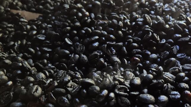 Traditional Coffee Bean Roasting Process on Wood Fire Stove with Thick Smoke