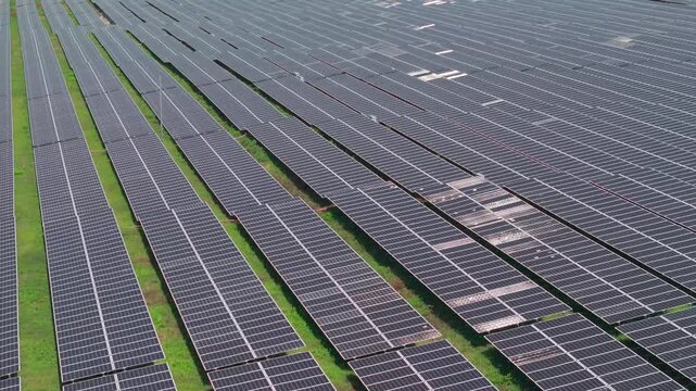 Aerial View of Large Solar Farm with Thousands of Photovoltaic Panels in Vietnam