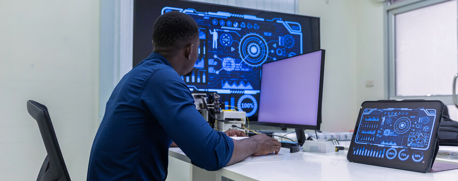 Black Researcher Making a Quantum Computing Experiment, Monitoring Live Artificial Intelligence Data on Computer Screen,