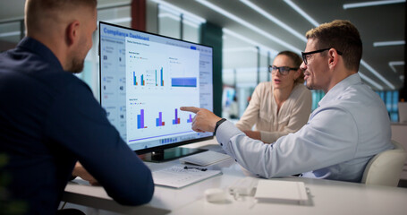 Fototapeta na wymiar Diverse Team Works Together Monitoring Risk Data