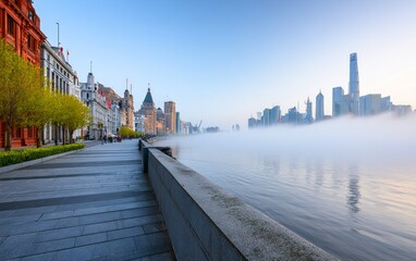 Obraz premium Misty Dawn by Huangpu Riverside in Shanghai with Colonial Bund Architecture