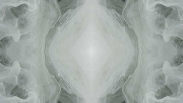 Mirrored smoke unfolding in close-up as pale gray symmetry forms a ritual pattern for occult titles, psychedelic visuals, mystic trailers, spiritual media, trance sequences, and esoteric backgrounds