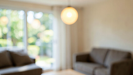 Fototapeta premium Pendant Light in a fully defocused interior of a bright serene living room