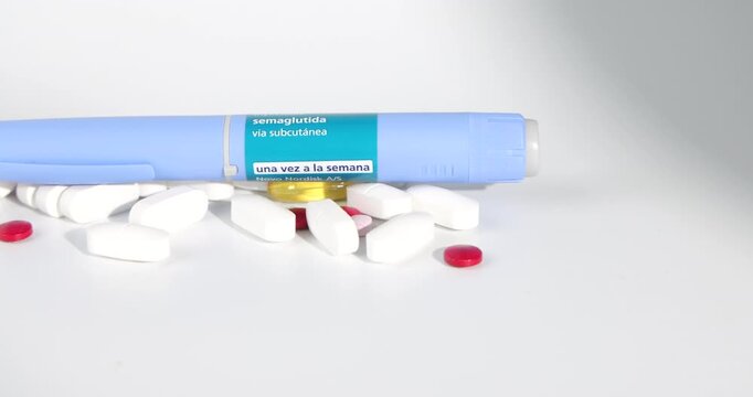 Beautiful horizontal layout showing a blue semaglutide injection pen and diabetes medication pills panning on rotating wooden framework