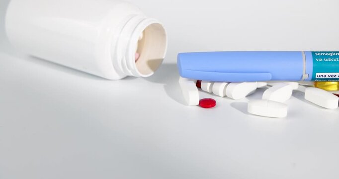 Detailed horizontal camera pan of medical semaglutide hormone pen sitting over diabetes capsules spinning slowly on a wood base layout