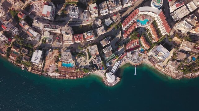 Top down aerial view of coastal hotels and resorts in Saranda Albania