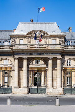 Paris, France - June 17, 2026: Front view of the portico of the Council of State, a public body created in 1799 by Napoleon, decked with french and European Union flags, located in the Palais Royal.