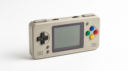 Obraz premium A small portable retro handheld video game console on a white background.