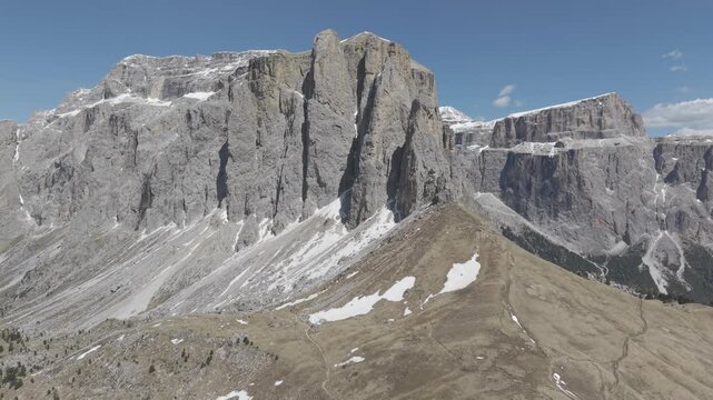 Massive Limestone Cliffs and Snowy Mountain Peaks in Alps