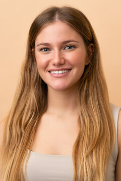 Portrait of blond pretty woman over isotaed background