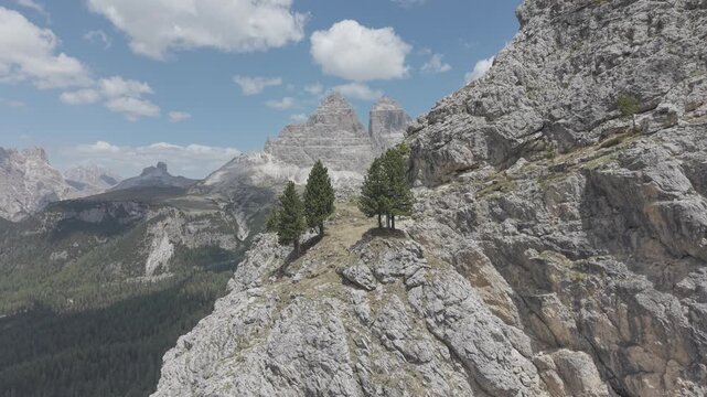 Dramatic Snow-Capped Jagged Mountain Peaks Under Blue Sky