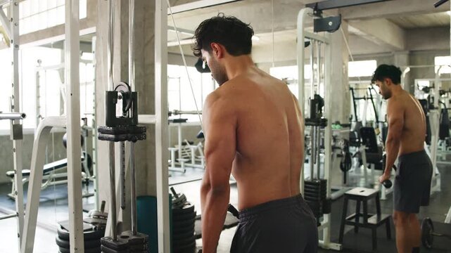 Athlete Performing Functional Triceps Pushdown