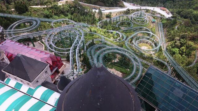 An impressive aerial view showcasing the intricate alpine coaster tracks winding through the lush landscape of Ba Na Hills, Vietnam.