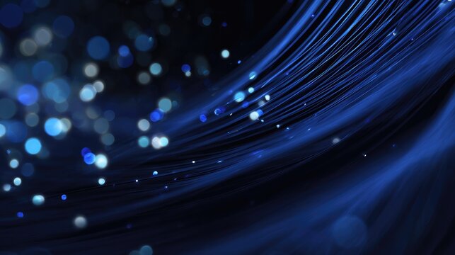 Flowing blue threads with glowing orbs and sparkling light against a dark background