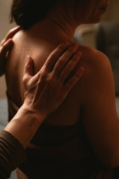 Back massage with hands close-up