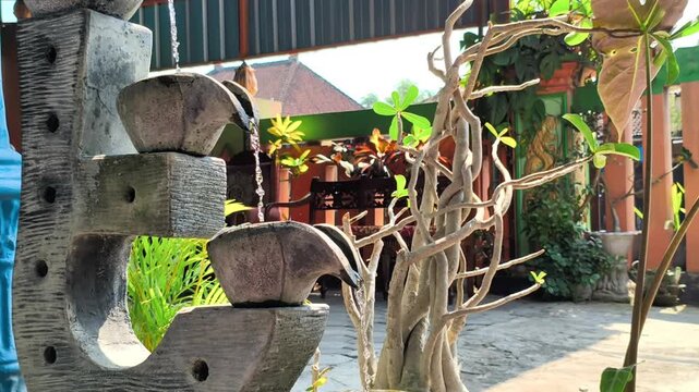 Mini Garden Fountain with House Yard Copy Space for Home Decoration Background Video