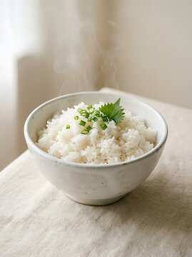 Steaming Hot Bowl of Freshly Cooked White Rice with Green Onions