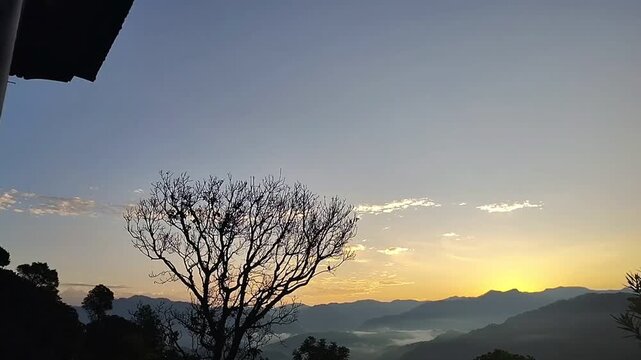 sunrise in the mountains of kumaon hills Uttarakhand , a timelapse video 